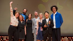 Les représentants du distributeur du jeu, Wilson Jeux, de Crocotame Illustration et d’Helvetiq à Cannes.