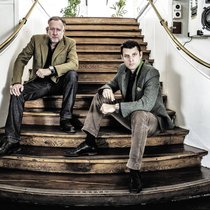 Martin Frei, artiste zurichois et designer attitré d’Urwerk, et Felix Baumgartner (à dr.) ont fait le choix de rester exclusifs.