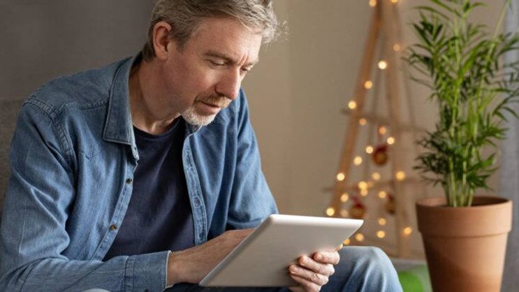 Man with tablet