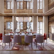 La salle à manger du chalet: le complexe de bâtiments est loué pour 12 à 14 millions de francs par an.