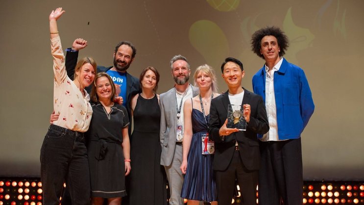 Les représentants du distributeur du jeu, Wilson Jeux, de Crocotame Illustration et d’Helvetiq à Cannes.
