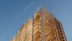 L’évolution des techniques anti-­incendies permet désormais d’utiliser le bois dans de grandes structures, comme ici pour les bâtiments Malley Phare.