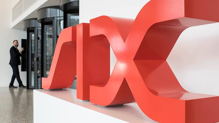 SIX qui entend à moyen terme réaliser des économies de 120 millions de francs, lesquelles impliquent la suppression sur l'année en cours de quelque 150 postes au niveau du groupe (archives).