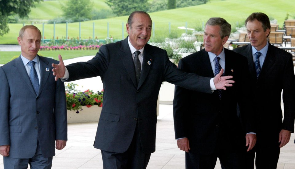 Vladimir Poutine, Jacques Chirac, George W. Bush et Tony Blair, lors du G8 à Evian en 2003.